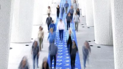 ILO staff walking in the ILO colonnades